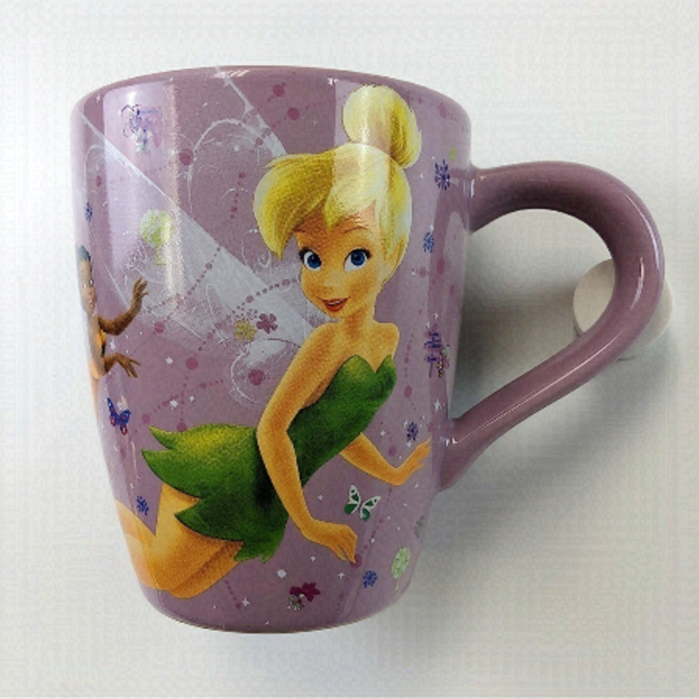 Disney Neverland ceramic 6 oz. mug featuring Tinker belle.